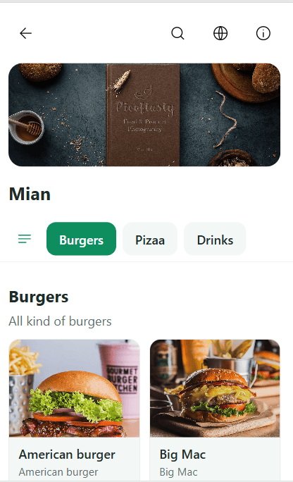 Smiling waiter taking an order on a tablet